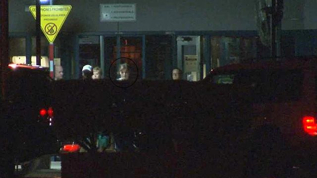Elizabeth Johnson, circled, walks out of the Perryville Prison just after midnight Friday. (Source: CBS 5 News)