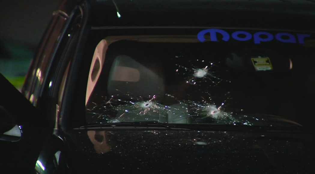 Bullets riddled the windshield of this SUV during a shootout in the parking lot of a Phoenix Walmart on Thursday night. (Source: CBS 5 News)